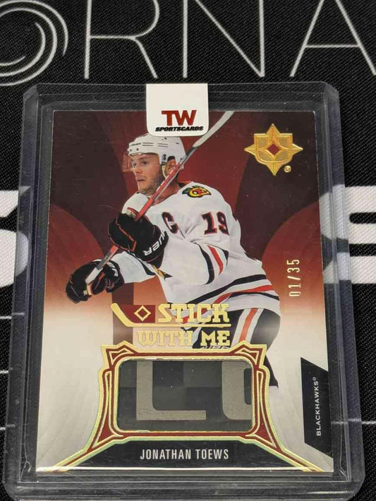2021-22 Upper Deck Ultimate Collection Stick With Me /35 Jonathan Toews #SWM-JT